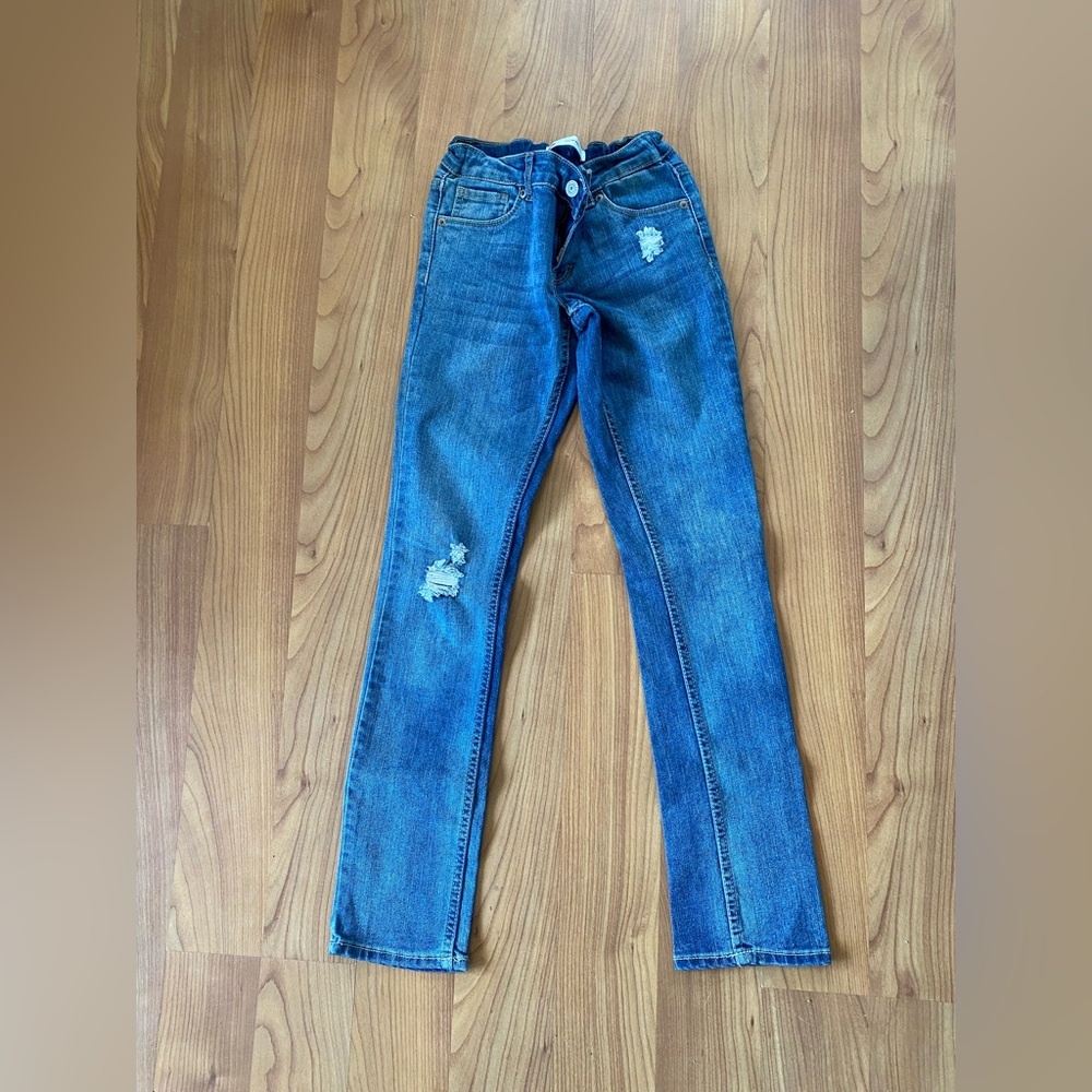 Levi’s lightly  ripped light wash jeans size 12 REG